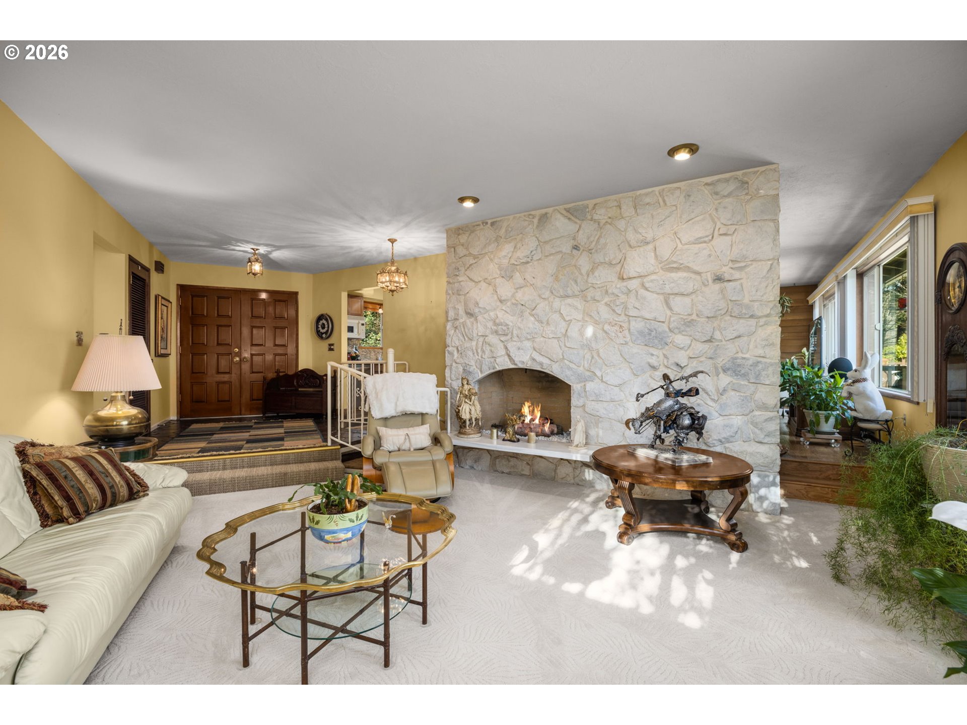 16020 Southeast Monner Road Happy Valley, OR 97086 - Photo 6 of 38 a living room with furniture and a fireplace