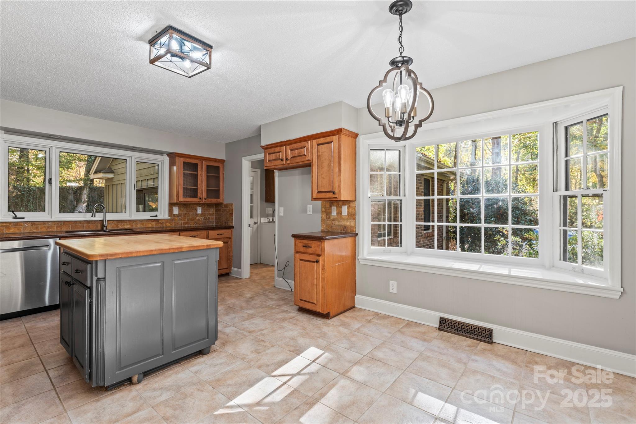 3616 Spokeshave Lane Matthews, NC 28105 - Photo 33 of 45 a view of kitchen with sink and refrigerator