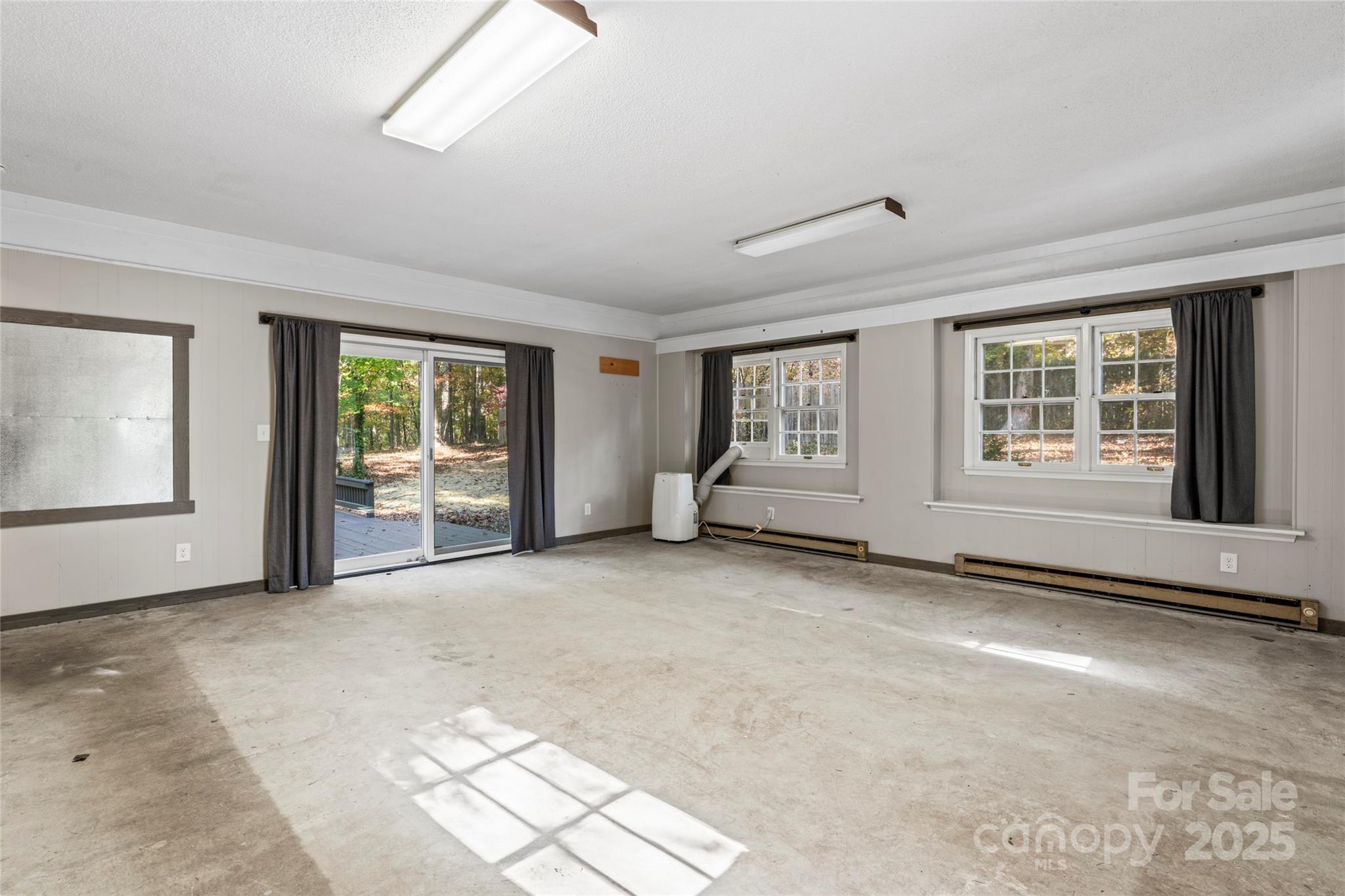 3616 Spokeshave Lane Matthews, NC 28105 - Photo 42 of 45 an empty room with windows