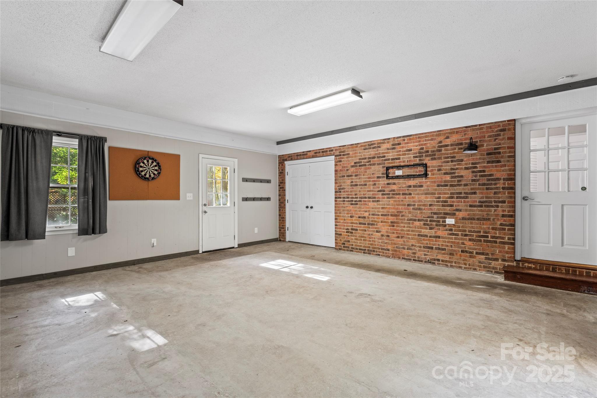 3616 Spokeshave Lane Matthews, NC 28105 - Photo 43 of 45 a view of an empty room with closet and windows
