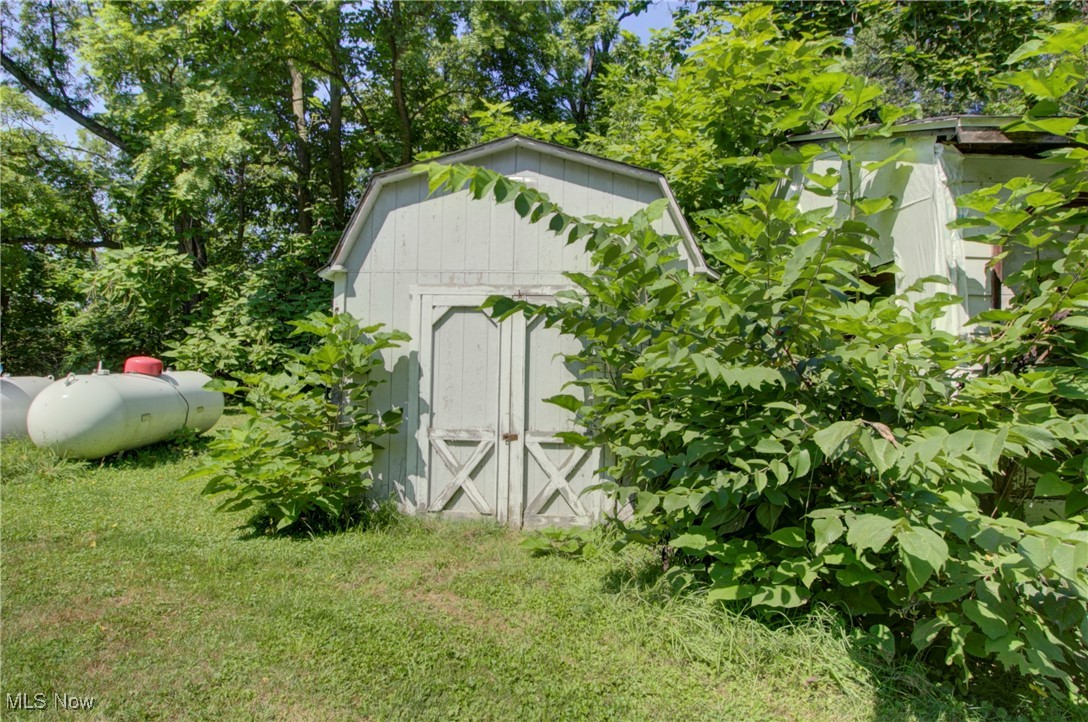 3227 Derussey Road Collins, OH 44826 - Photo 22 of 28 View of shed featuring view of scattered trees