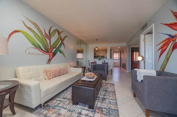 a view of a balcony with furniture