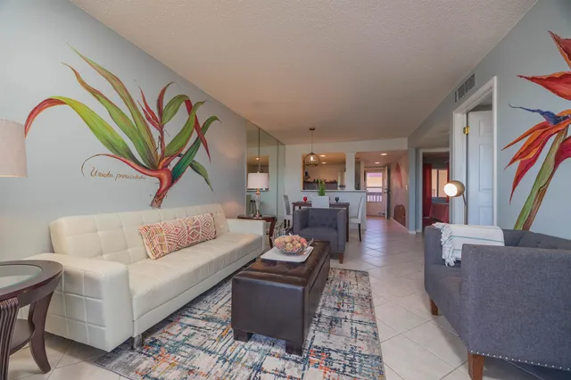 a view of a balcony with furniture