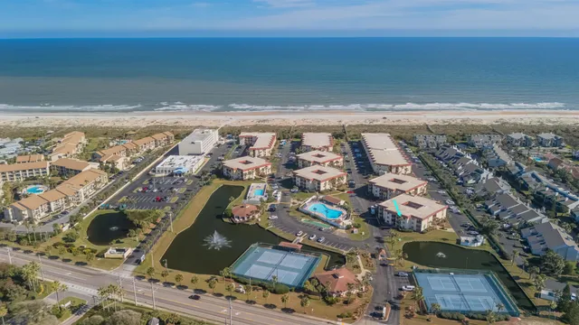 a view of outdoor space with wooden floor and stairs