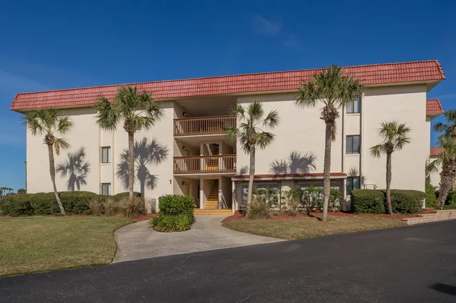 a stove top oven sitting inside of a kitchen