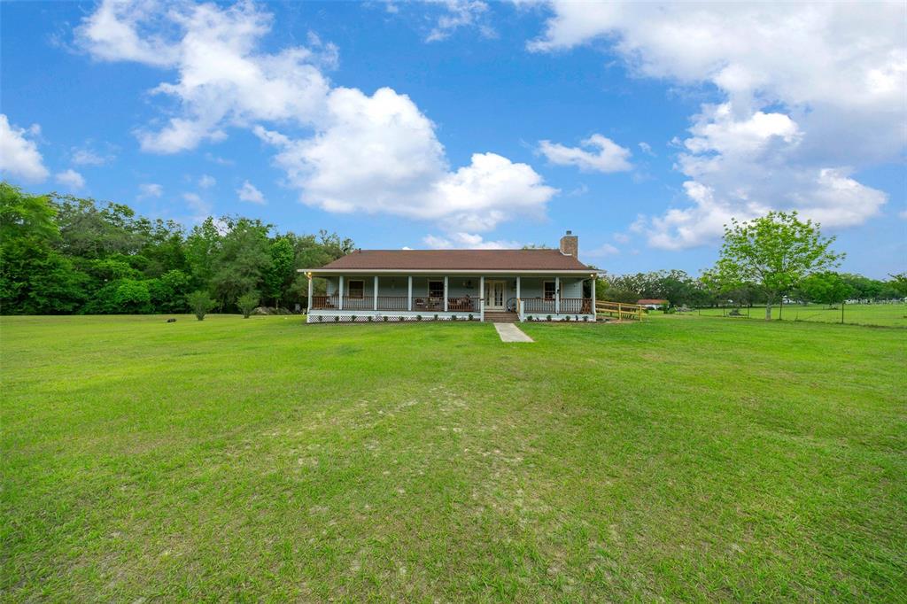 732 Carl Wilson Road Fort White, FL 32038 - Photo 64 of 80 a view of an house with backyard space and balcony