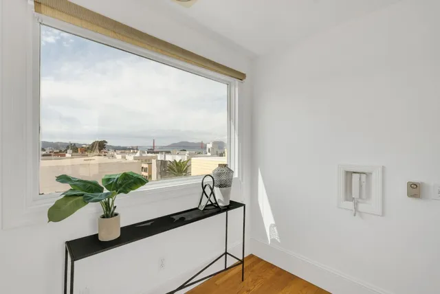 a view of balcony with furniture