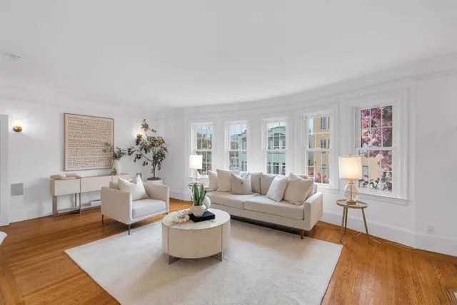 a living room with furniture and a couch