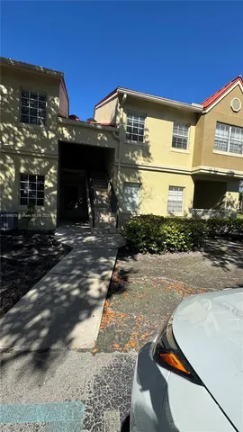 a view of a building with a street