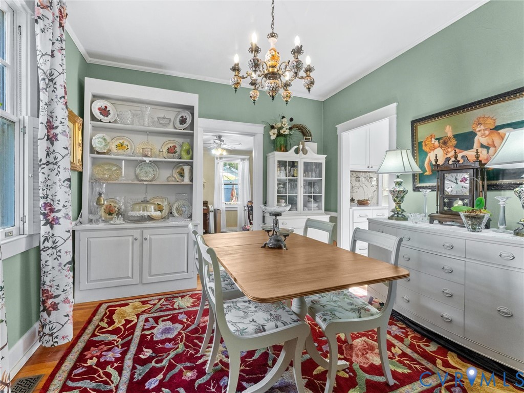 1812 Seddon Road Richmond, VA 23227 - Photo 12 of 56 Hardwood flooring complements a built-in display h
