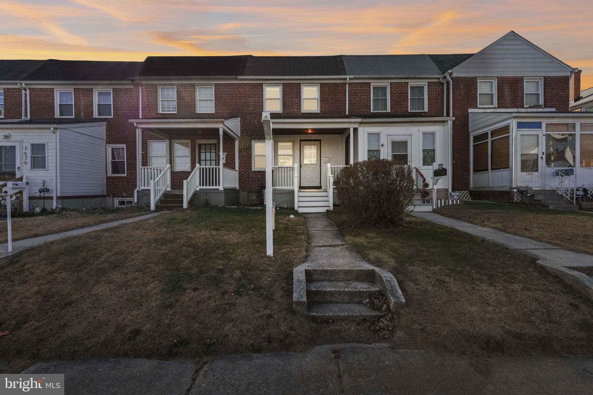 7571 Westfield Road Dundalk, MD 21222 - Photo 16 of 21 a front view of a house with a yard