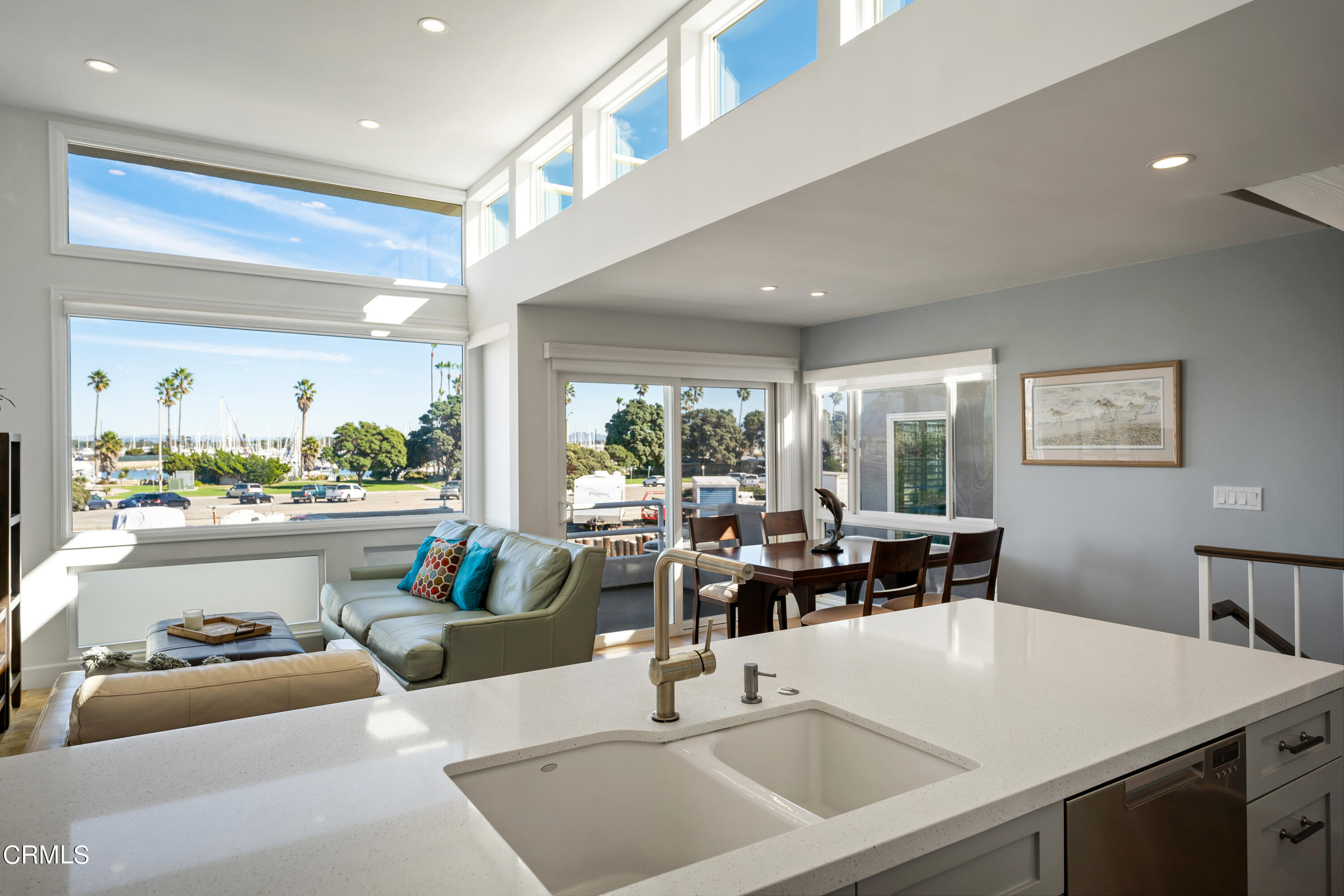 3545 Sunset Lane Oxnard, CA 93035 - Photo 15 of 41 a living room with furniture a window and a view of kitchen