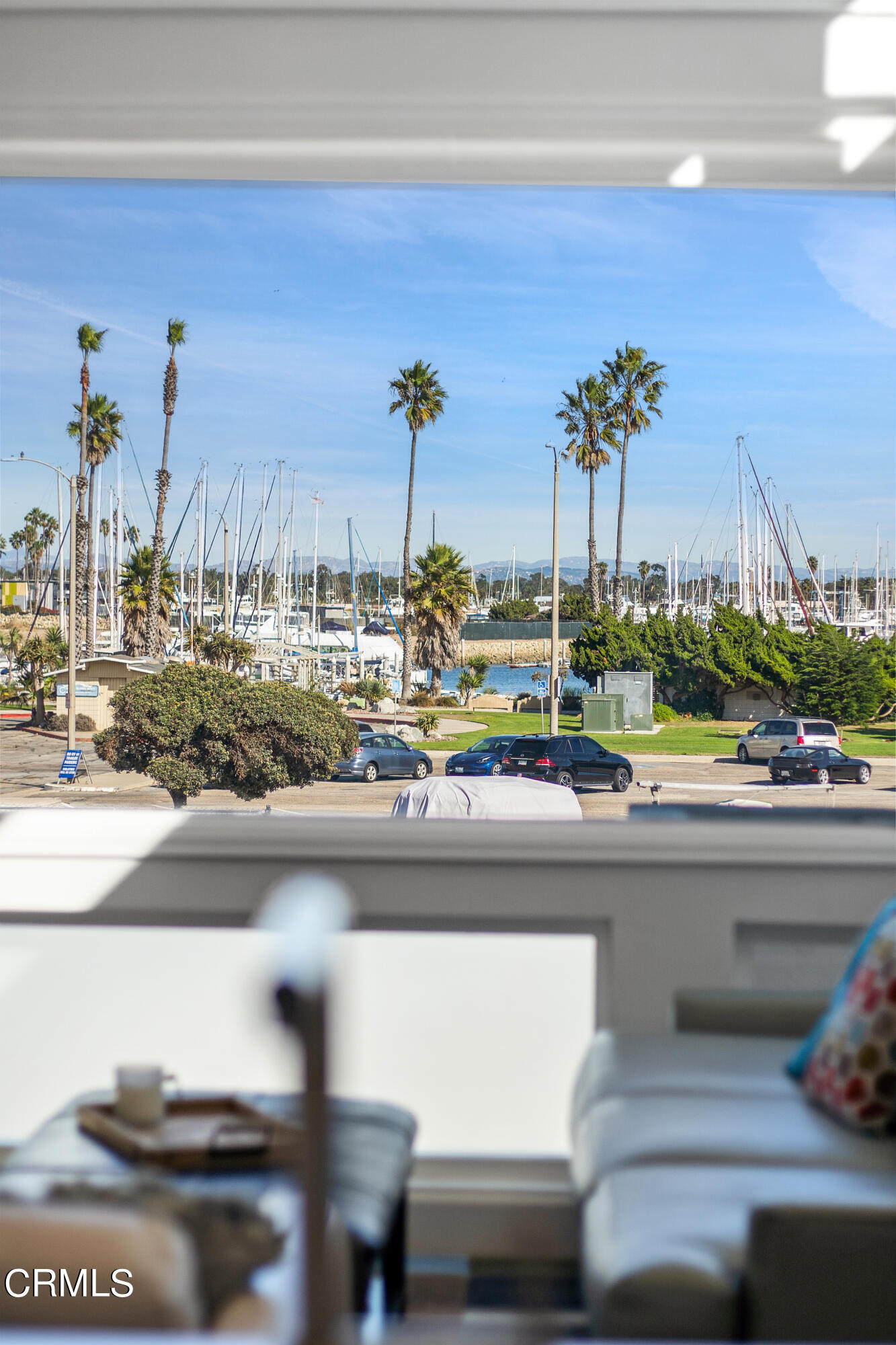 3545 Sunset Lane Oxnard, CA 93035 - Photo 16 of 41 a view of living room with furniture and floor to ceiling window