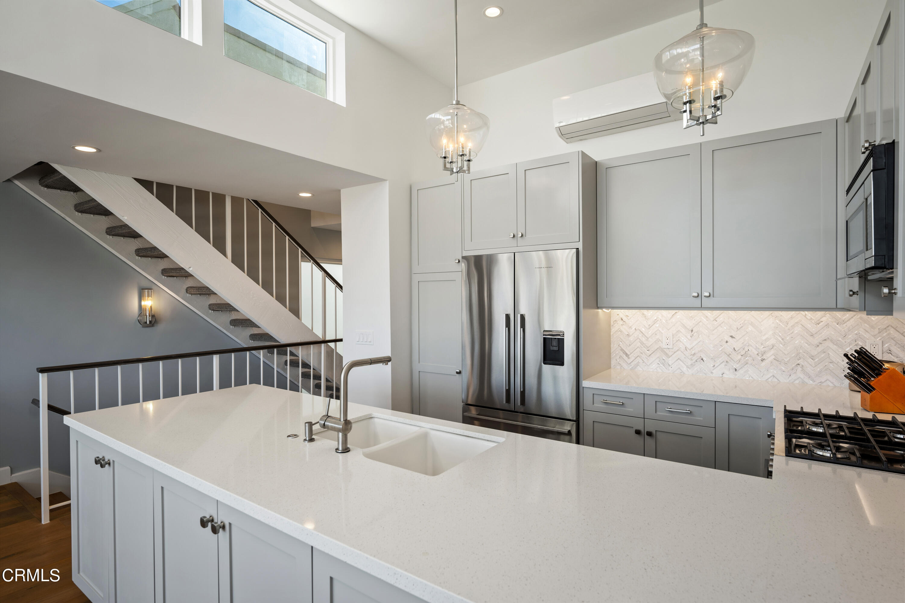 3545 Sunset Lane Oxnard, CA 93035 - Photo 17 of 41 a kitchen with stainless steel appliances a sink and a refrigerator