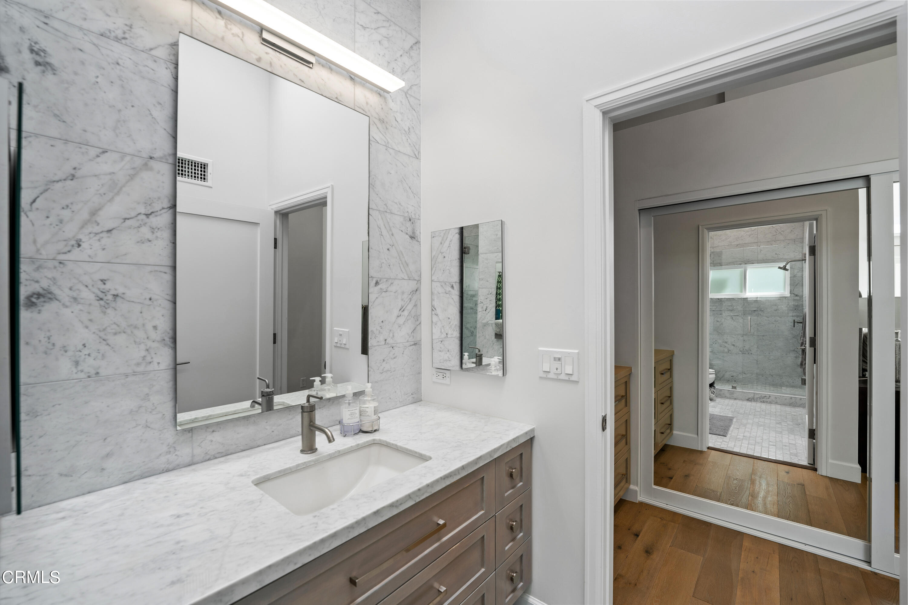 3545 Sunset Lane Oxnard, CA 93035 - Photo 24 of 41 a bathroom with a granite countertop sink mirror and shower