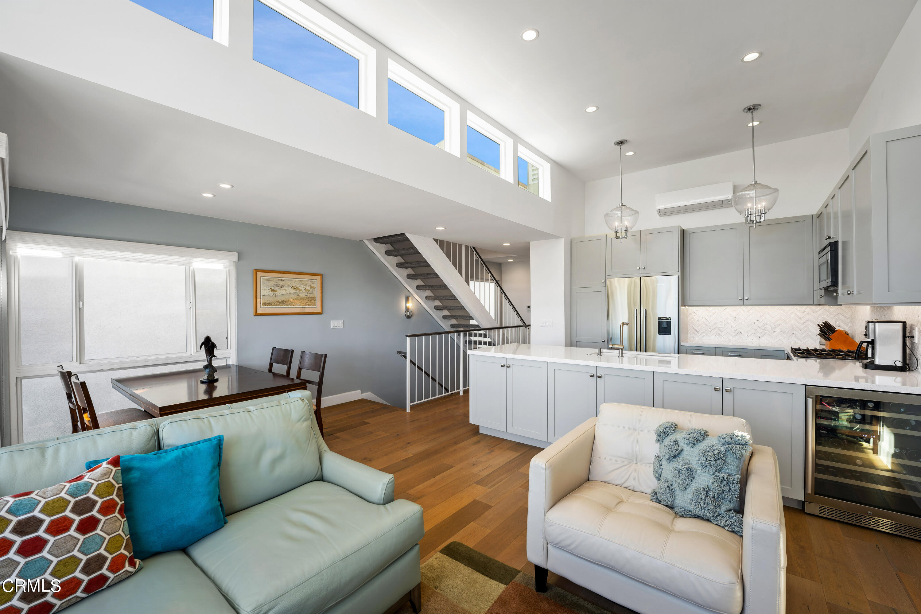 3545 Sunset Lane Oxnard, CA 93035 - Photo 9 of 41 a living room with furniture and kitchen view