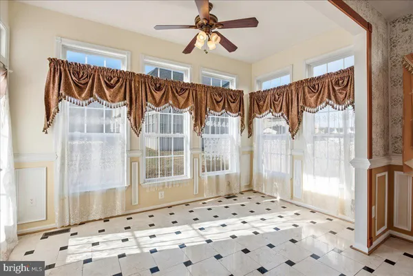 a bathroom with a tub and a shower