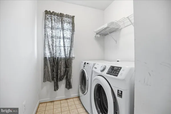a front view of a house with a porch