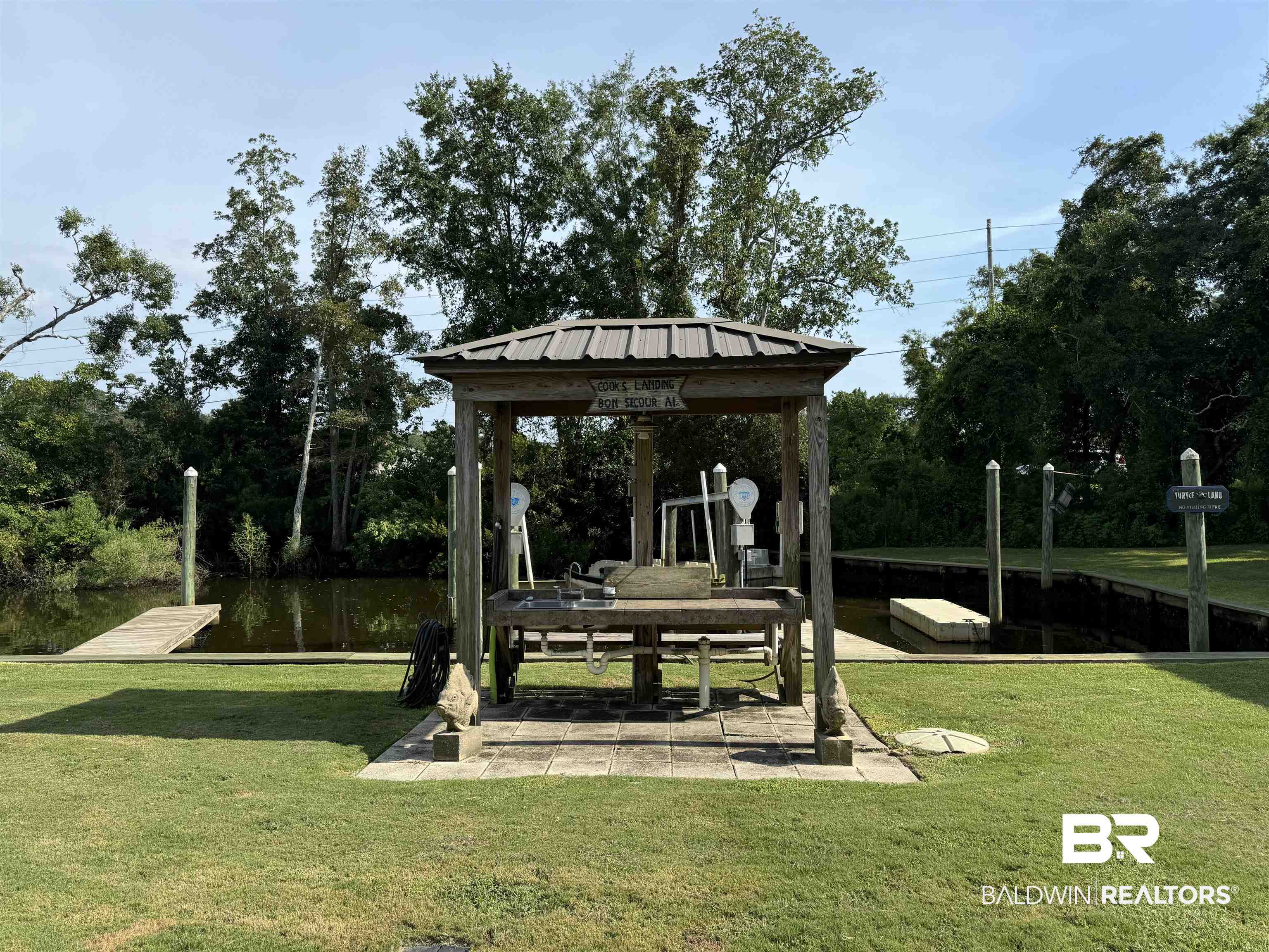 7544 Wenzel Road, Unit B6 Foley, AL 36535 - Photo 6 of 15 Community Fish Cleaning Area
