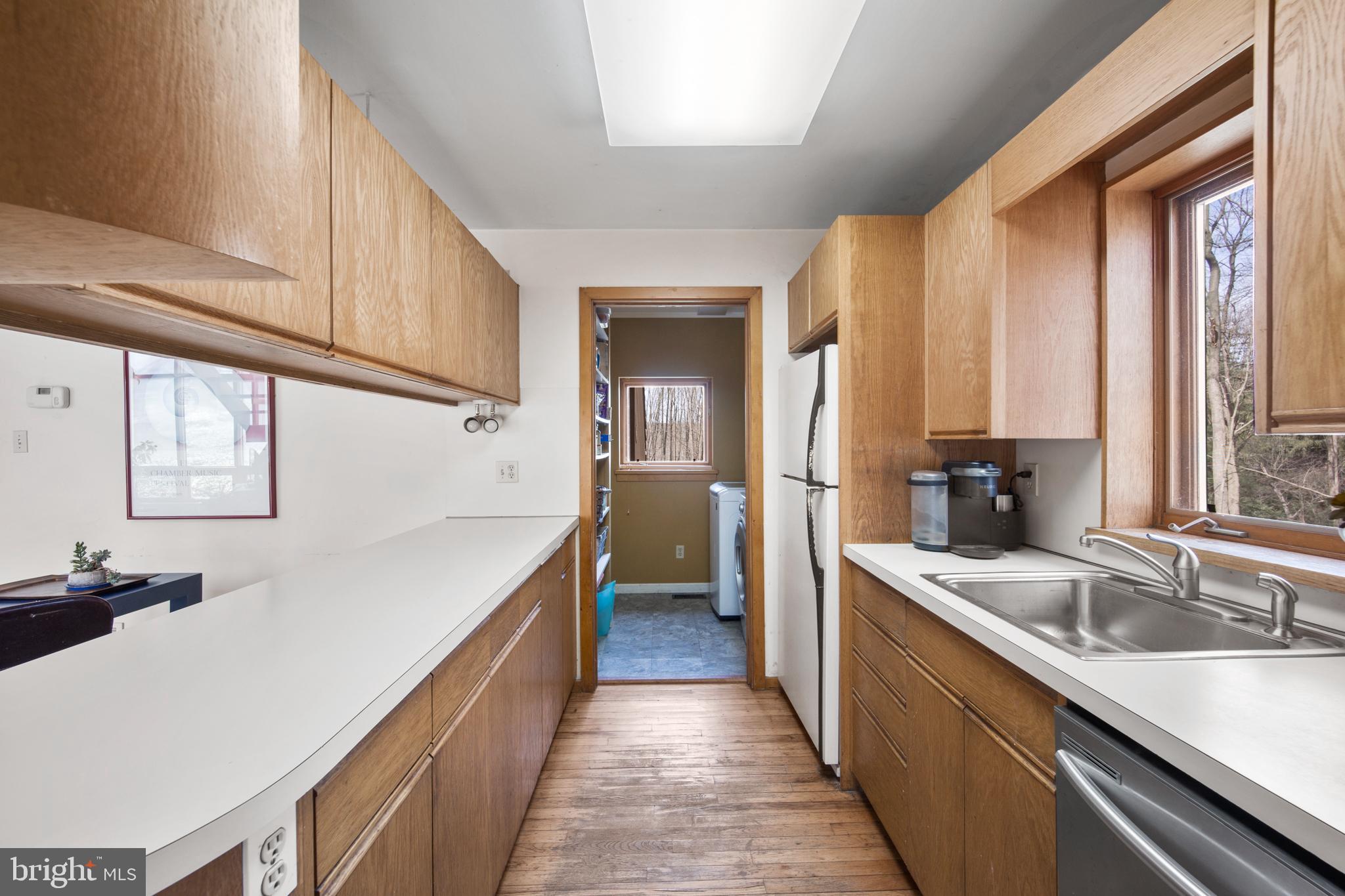 1749 Pickering Road Phoenixville, PA 19460 - Photo 11 of 28 Kitchen with adjacent laundry room / pantry
