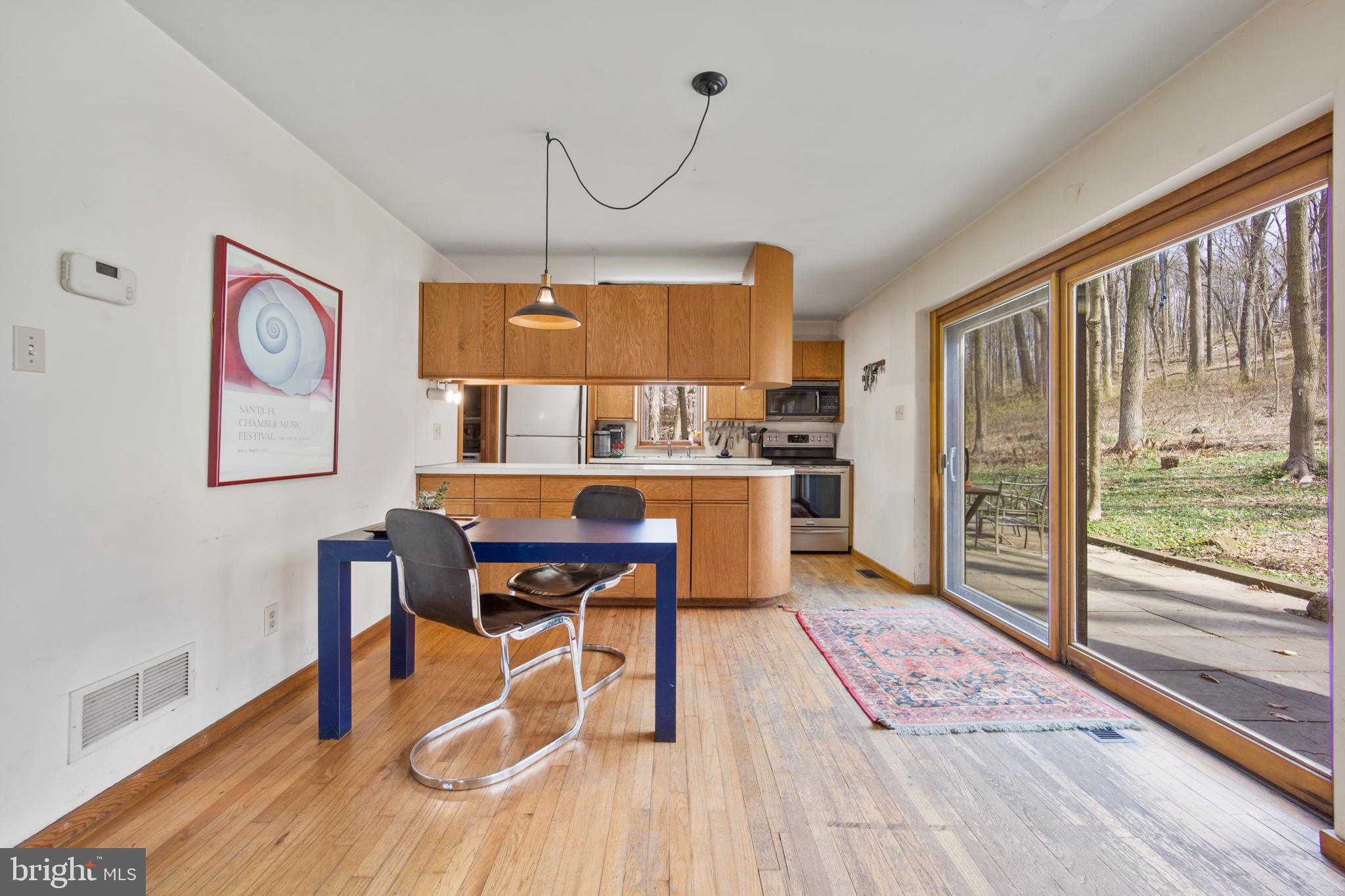 1749 Pickering Road Phoenixville, PA 19460 - Photo 9 of 28 Dining area, original kitchen island & cabinetry