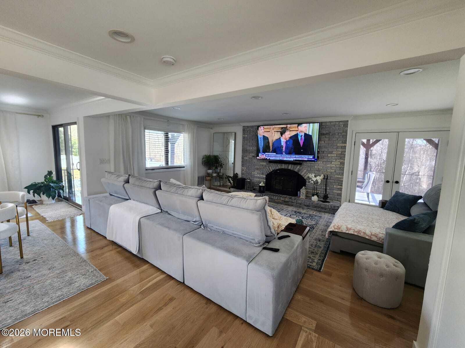 1120 Farmingdale Road Jackson, NJ 08527 - Photo 3 of 8 a living room with furniture and a large window