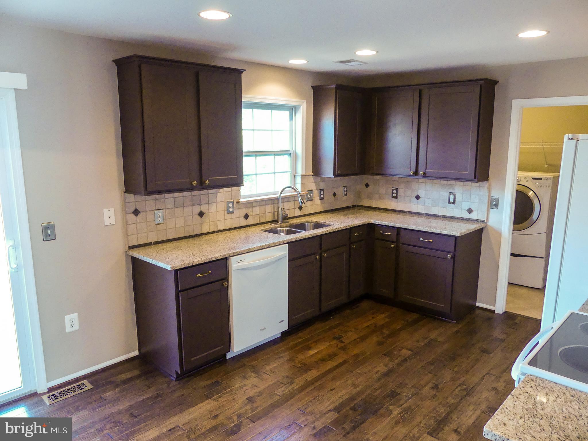 28 Ripley Road Stafford, VA 22556 - Photo 5 of 29 Kitchen flows to the laundry and garage.