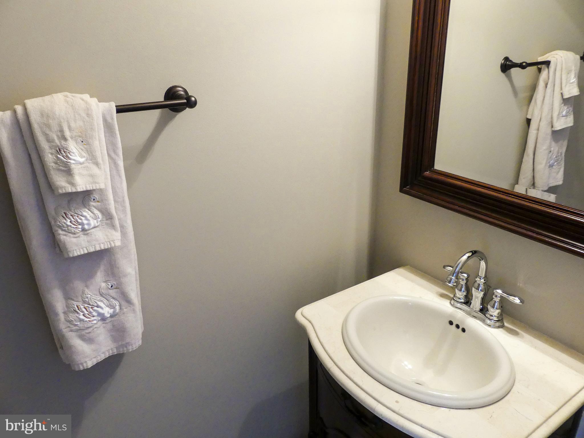 28 Ripley Road Stafford, VA 22556 - Photo 8 of 29 Half bath with custom vanity and mirror.