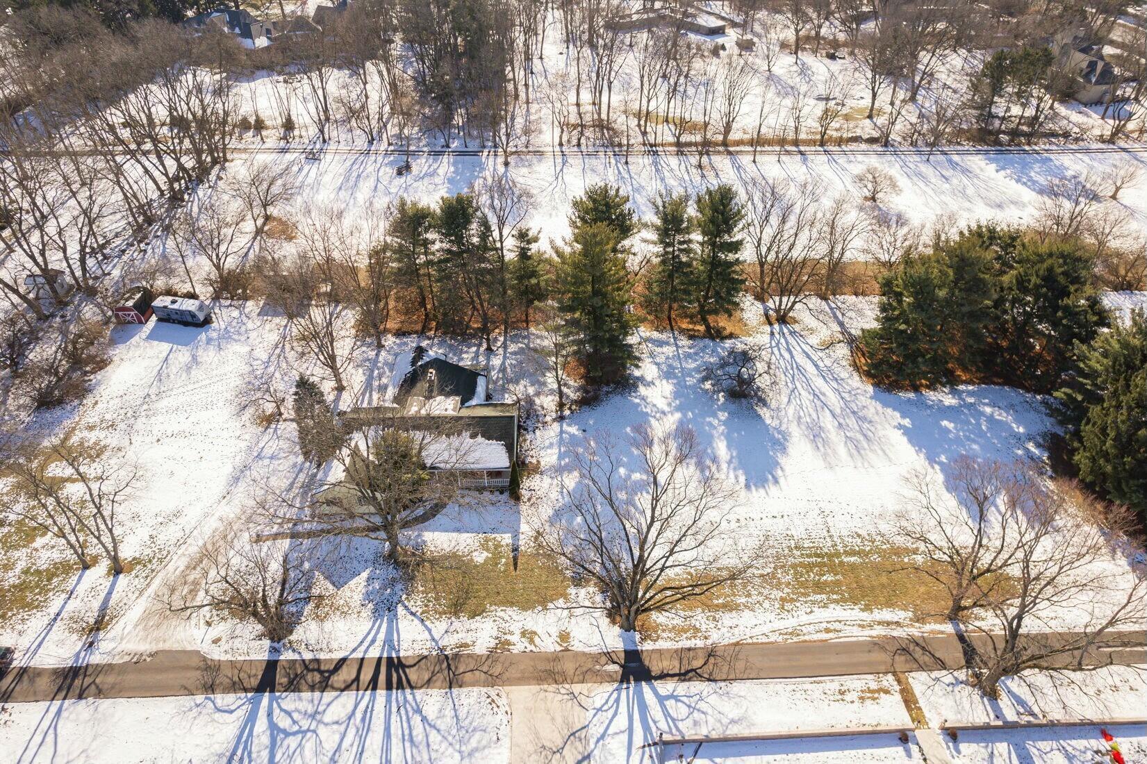 4446 Dublin Road Columbus, OH 43221 - Photo 59 of 62 Drone view of the house and 1.79 acres