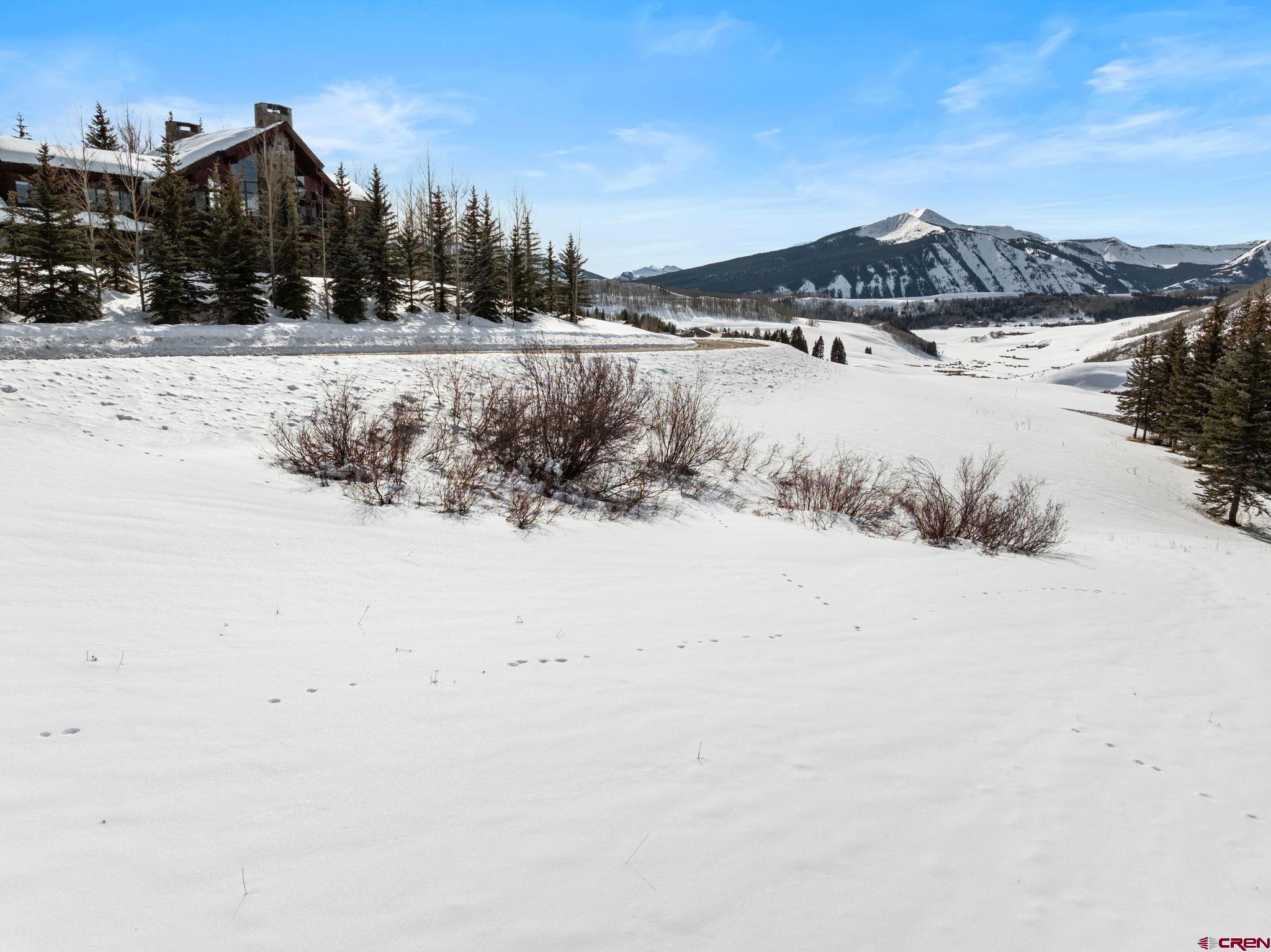 7 Gold Link Drive Crested Butte, CO 81225 - Photo 17 of 26 a view of a lake with a mountain