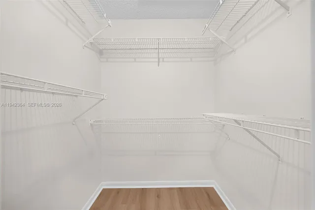 a view of a room with racks on the wall