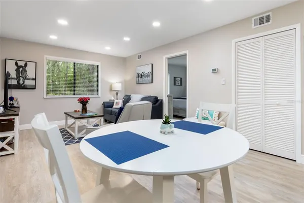 a view of a dining room with furniture