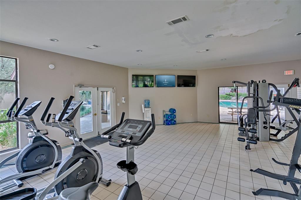 75 Southeast 16th Avenue, Unit A101 Gainesville, FL 32601 - Photo 20 of 24 a view of a room with gym equipment