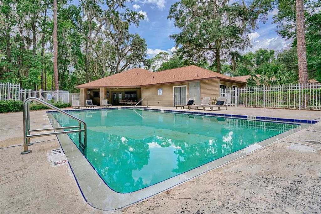 75 Southeast 16th Avenue, Unit A101 Gainesville, FL 32601 - Photo 23 of 24 a view of a house with a yard