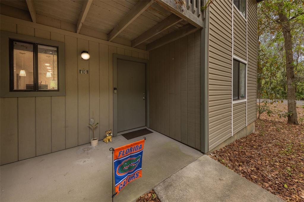 75 Southeast 16th Avenue, Unit A101 Gainesville, FL 32601 - Photo 3 of 24 a backyard of a house