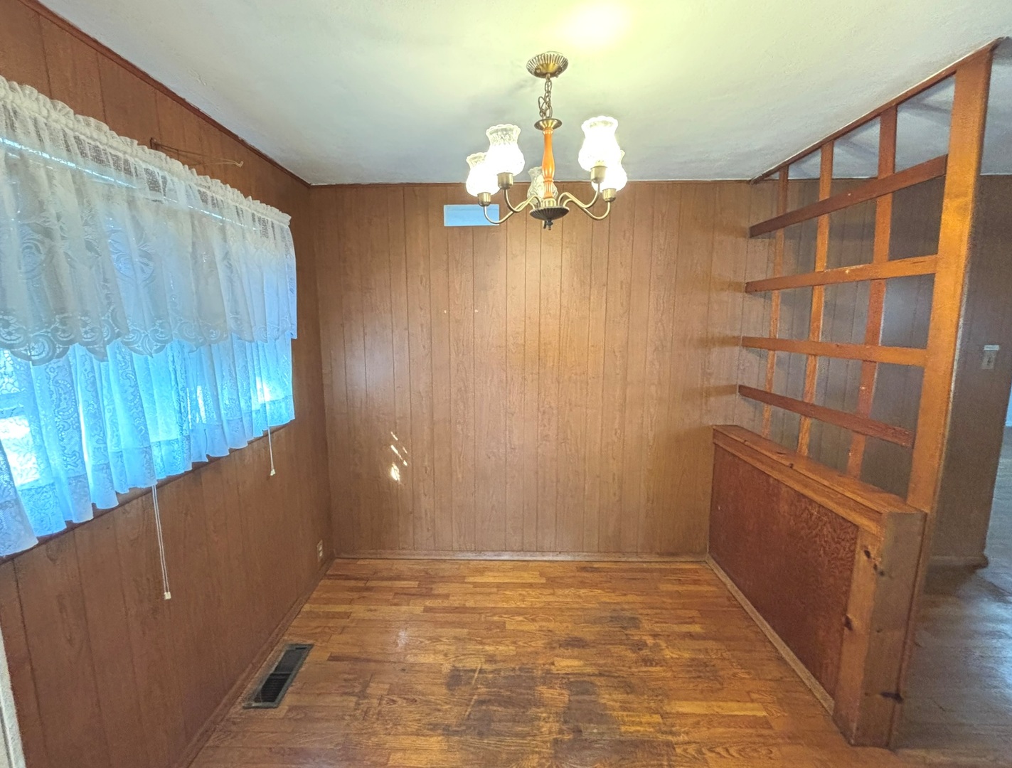 107 Dewolf Street Odin, IL 62870 - Photo 4 of 10 a view of an empty room with a window