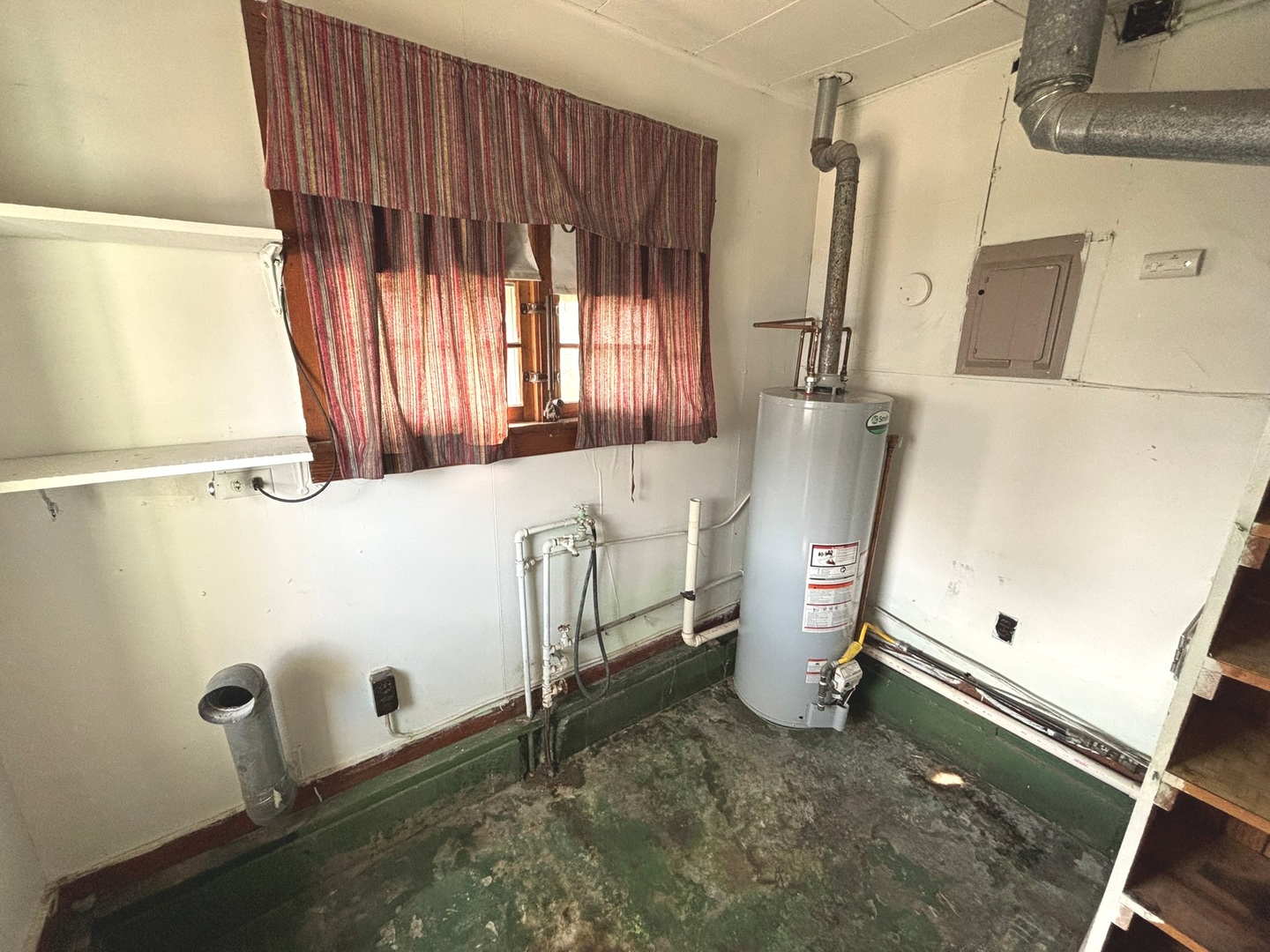 107 Dewolf Street Odin, IL 62870 - Photo 9 of 10 a bathroom with a sink and a window