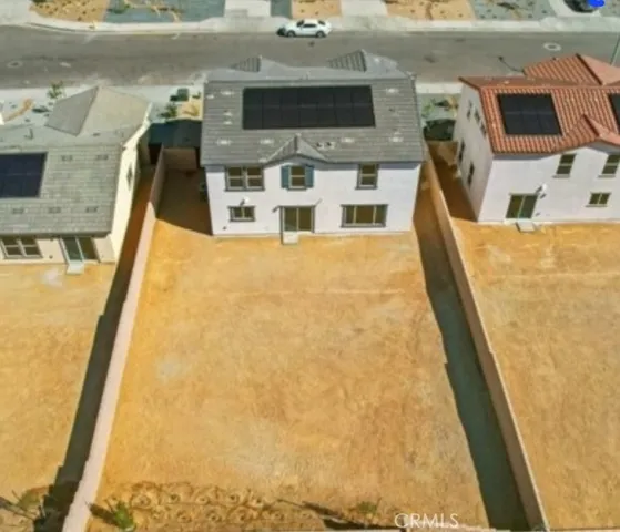 a kitchen with a sink a stove and a microwave