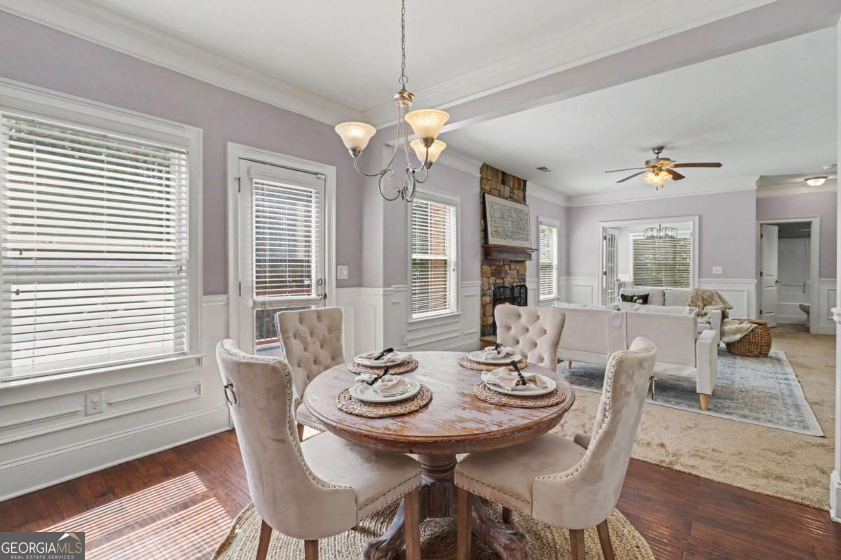 207 George Wynn Road Palmetto, GA 30268 - Photo 9 of 32 a view of a dining room with furniture window and wooden floor