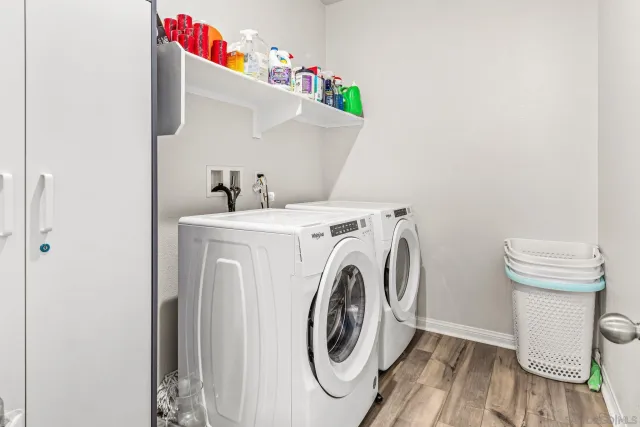 a utility room with dryer and washer