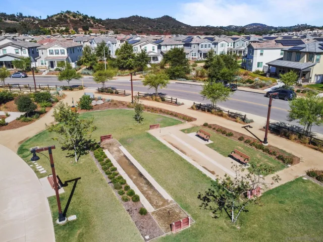a view of a city with lawn chairs