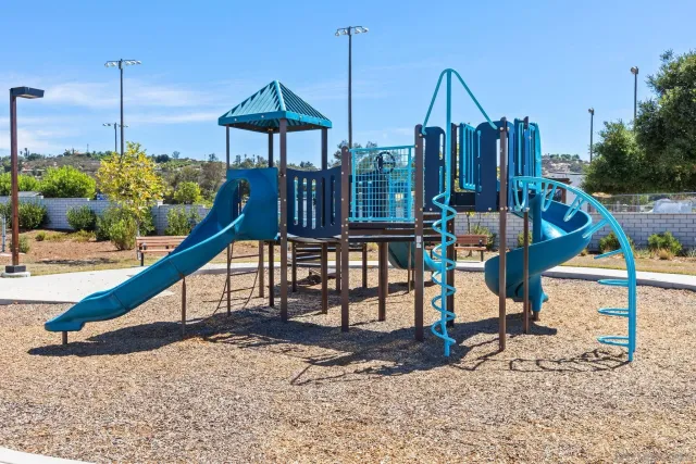 a view of a park with chairs
