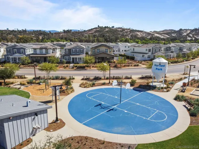 a view of a swimming pool with a table and chairs