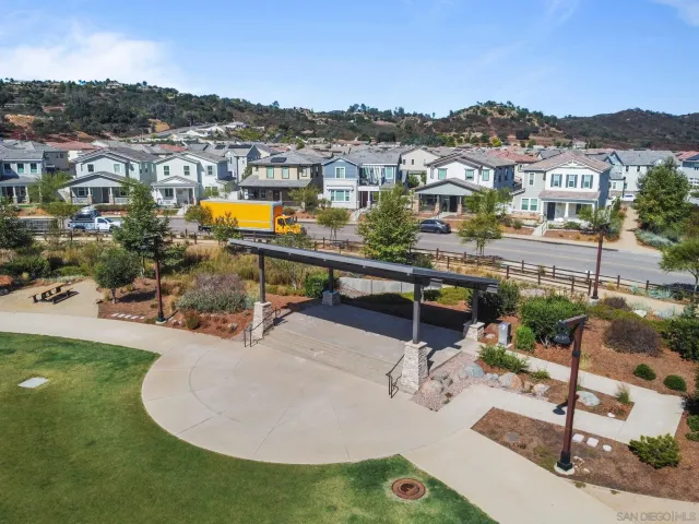 a view of a swimming pool with a lounge chairs