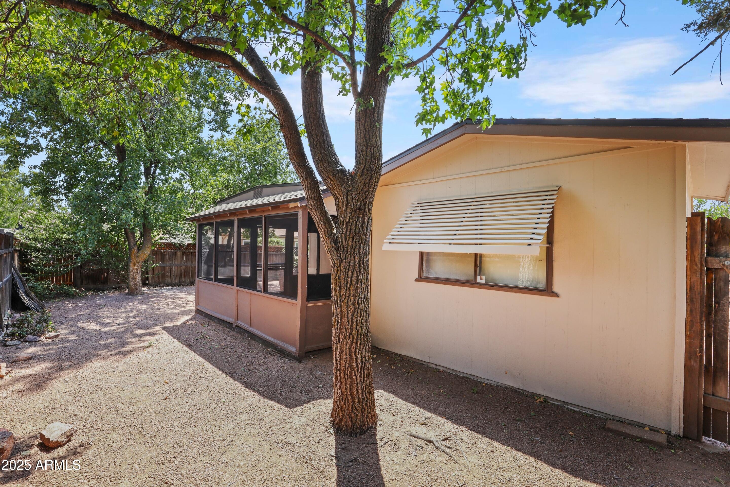 117 South Lakeshore Road Payson, AZ 85541 - Photo 29 of 33 a view of a house with a yard