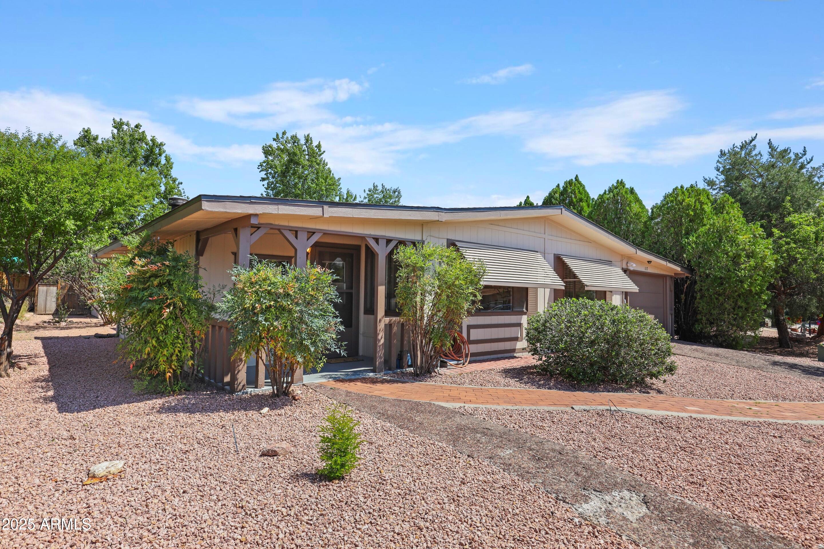 117 South Lakeshore Road Payson, AZ 85541 - Photo 31 of 33 front view of a house with a yard