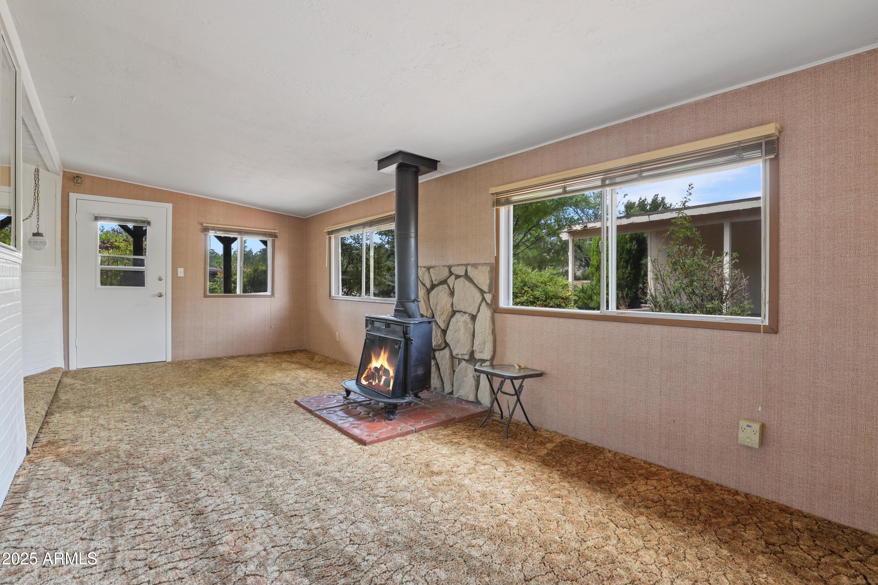 117 South Lakeshore Road Payson, AZ 85541 - Photo 4 of 33 a view of a workspace with furniture and a window