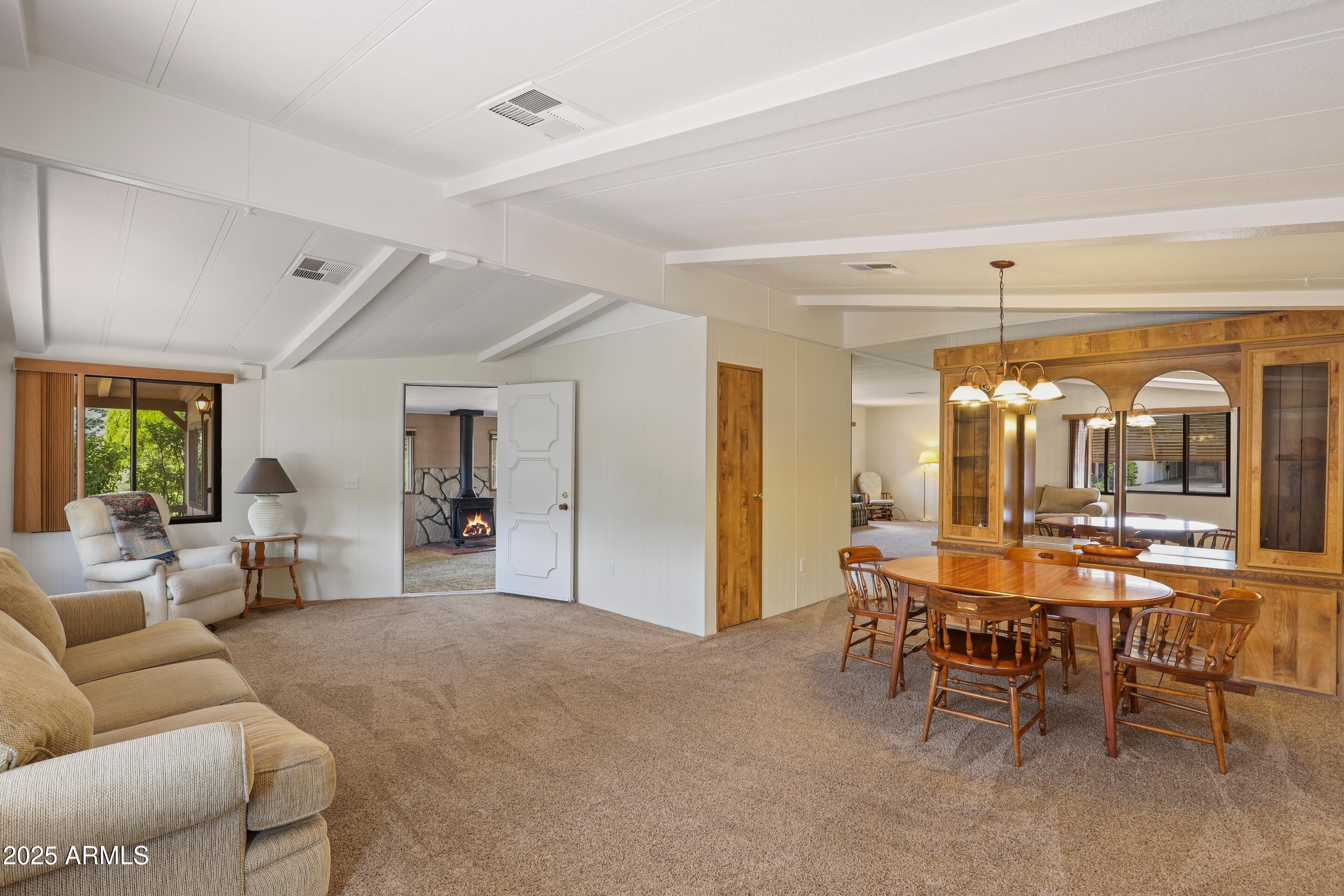 117 South Lakeshore Road Payson, AZ 85541 - Photo 6 of 33 a living room with furniture and a large window