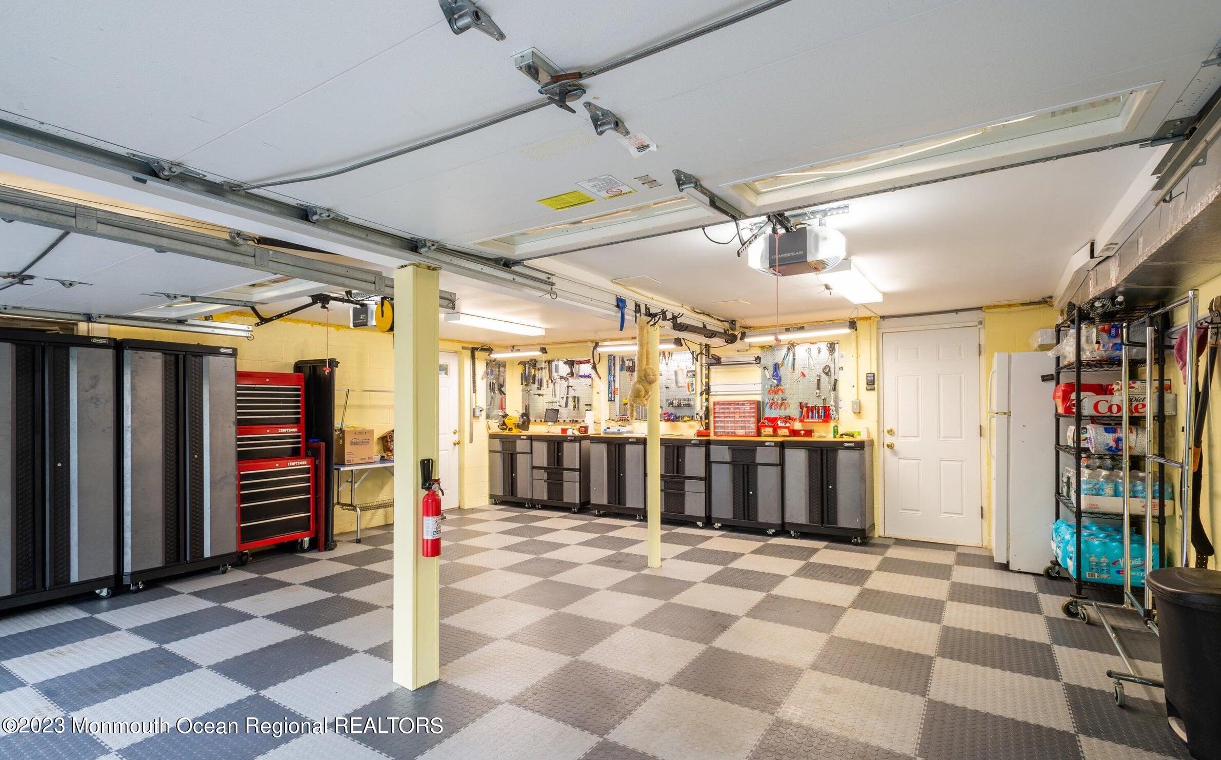 26 Van Brackle Road Holmdel, NJ 07733 - Photo 30 of 36 a view of a porch with a table and chairs