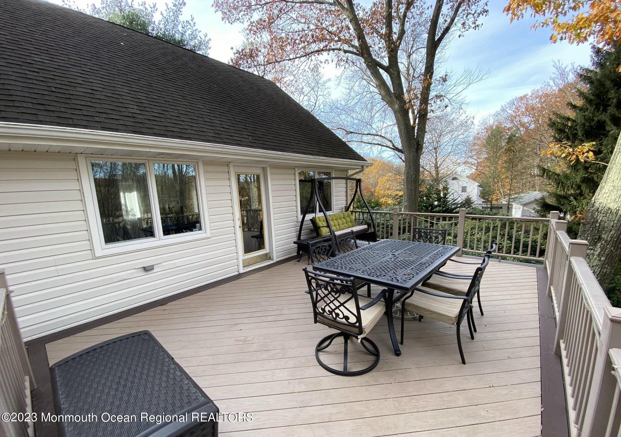 26 Van Brackle Road Holmdel, NJ 07733 - Photo 6 of 36 a view of a outdoor seating area with furniture